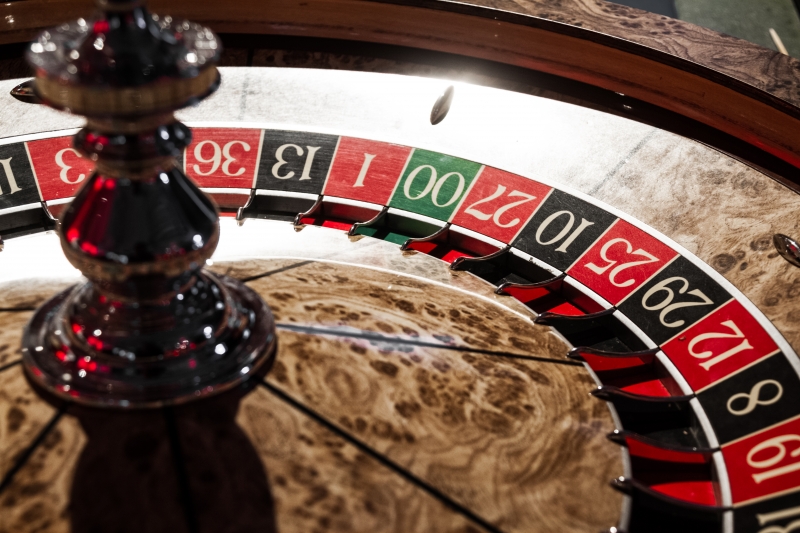 8823092-wooden-shiny-roulette-details-in-a-casino